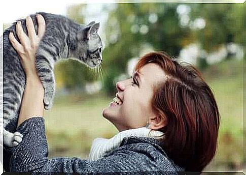 Happy girl with her cat